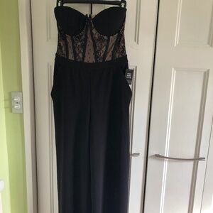 Beautiful Express Brand Jump Suit with corseted lace top.